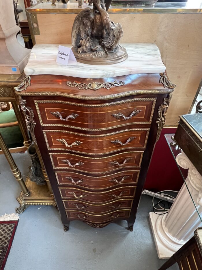Semainier en bois de placage forme mouvementé et galbé, époque XXe siècle