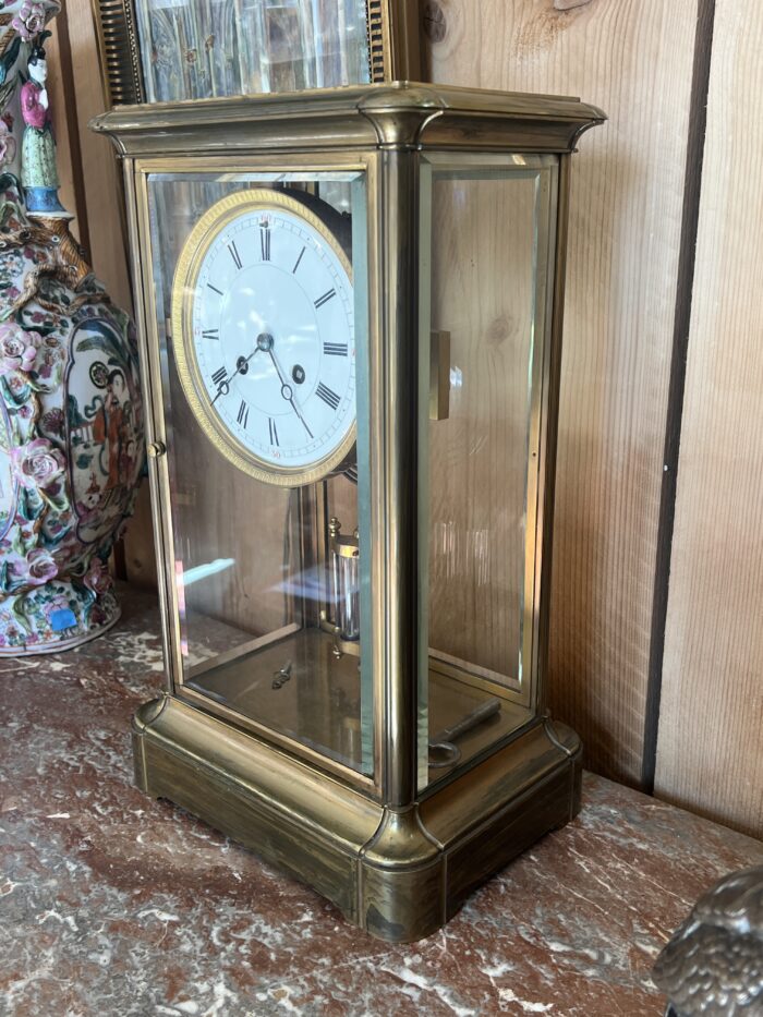 Pendule cage en laiton doré et massif, mouvement signé Marti, fin XIXe siècle