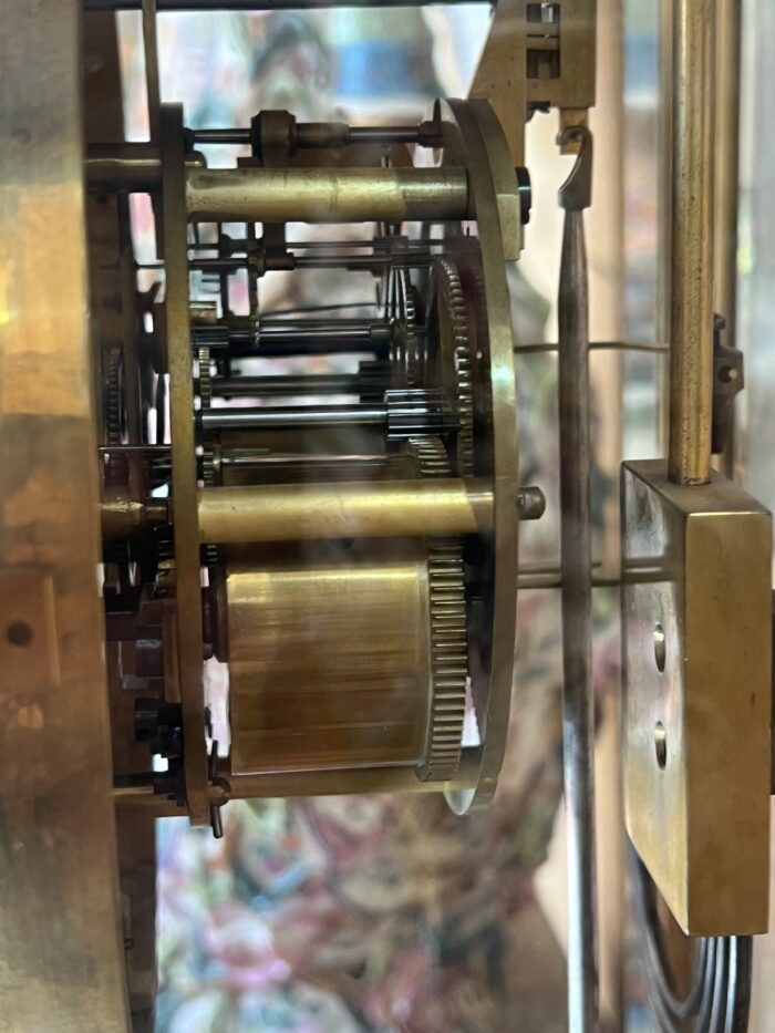 Pendule cage en laiton doré et massif, mouvement signé Marti, fin XIXe siècle