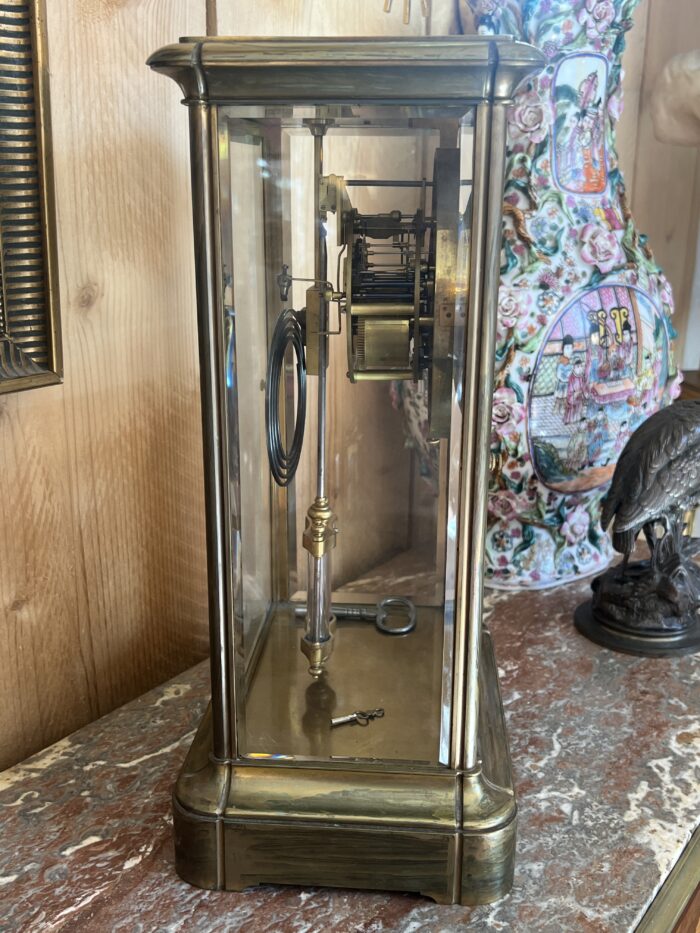 Pendule cage en laiton doré et massif, mouvement signé Marti, fin XIXe siècle