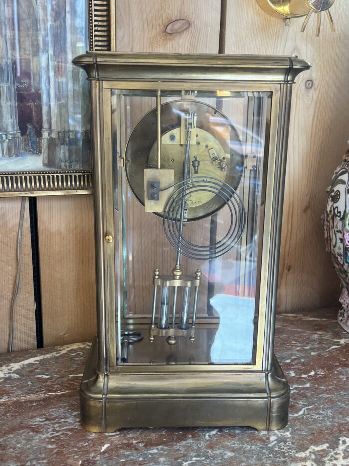 Pendule cage en laiton doré et massif, mouvement signé Marti, fin XIXe siècle